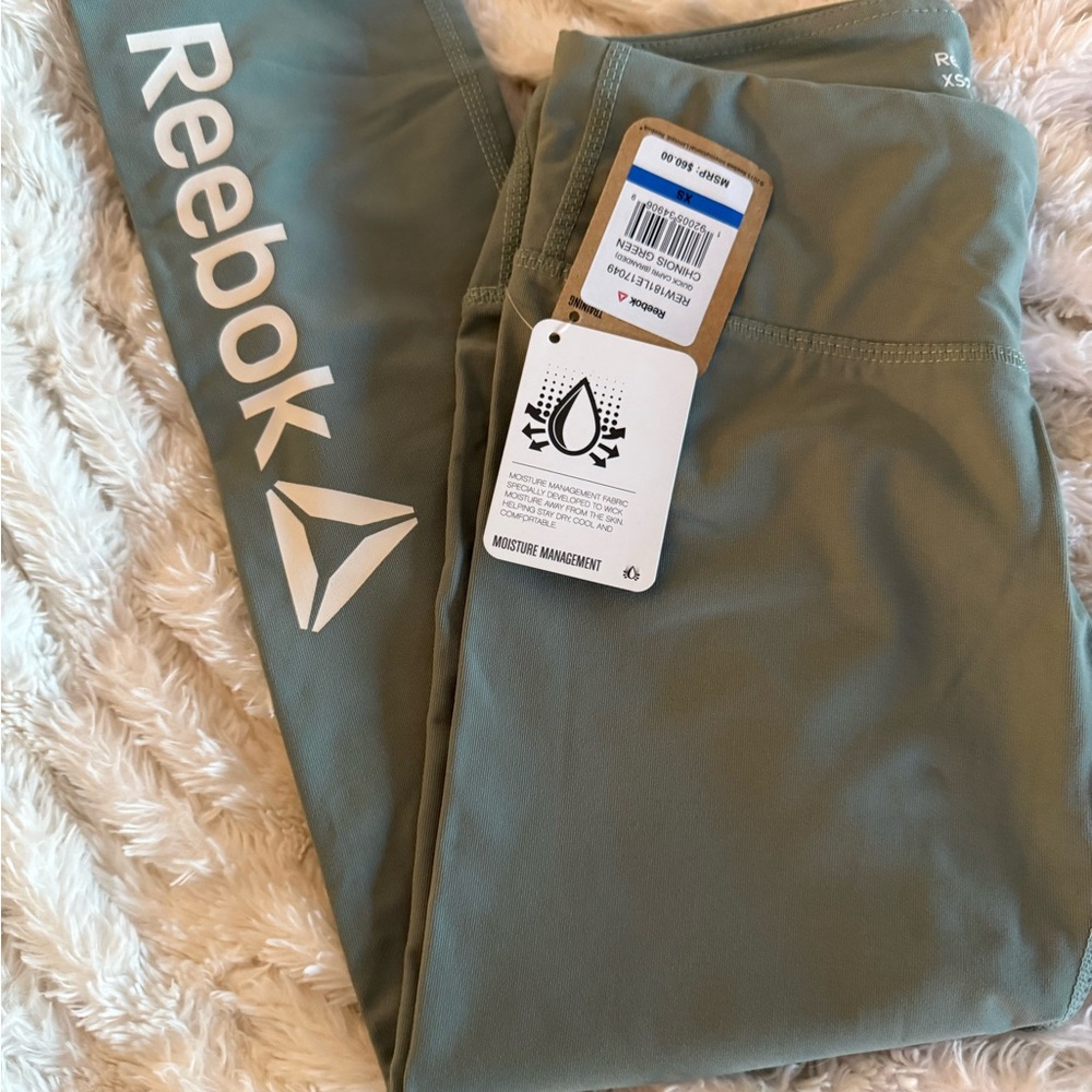 Reebok Women's Capris - Set of 4 1-Mint, 1-Silver, 1-Black and 1 black short. - Picture 5 of 14